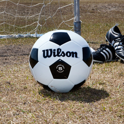 WILSON® Soccer Ball - Traditional black and white synthetic leather soccer ball.  Official size and weight, size - 5, for ages 12 years and older.